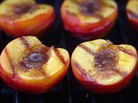 Jack Bishop of America's Test Kitchen says the trick to grilling peaches is using fruit that's ripe but firm. Jack Bishop of America's Test Kitchen says the trick to grilling peaches is using fruit that's ripe but firm.