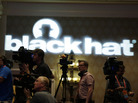 The press set up to film Army Gen. Keith Alexander, head of the National Security Agency, at the Black Hat hacker conference on Wednesday. The press set up to film Army Gen. Keith Alexander, head of the National Security Agency, at the Black Hat hacker conference on Wednesday.