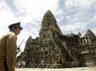 A police officer guards Cambodia's famed temple of Angkor Wat. The powerful city-state collapsed in 1431 after suffering through two decades of droughts. A police officer guards Cambodia's famed temple of Angkor Wat. The powerful city-state collapsed in 1431 after suffering through two decades of droughts.