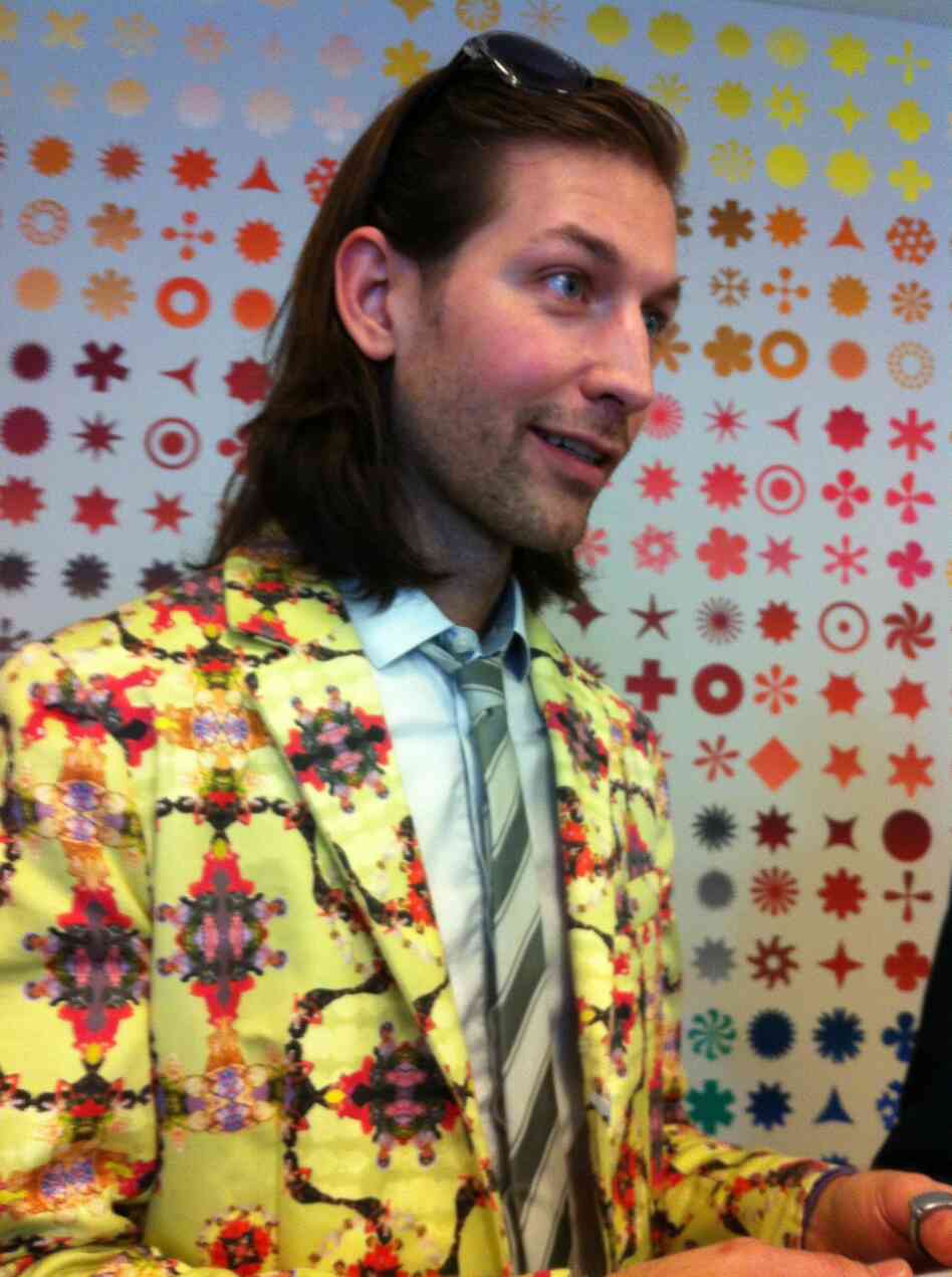 One of the best outfits at the exhibit wasn't actually part of the show: Museumgoer Aaron Peterman designed and made this suit, with its pattern of legendary drag queens on a sunny yellow background. One of the best outfits at the exhibit wasn't actually part of the show: Museumgoer Aaron Peterman designed and made this suit, with its pattern of legendary drag queens on a sunny yellow background.