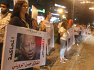 Activists from a group called "Third Square," which promotes a middle way in the rift between the Muslim Brotherhood and supporters of the army's overthrow of Egyptian President Mohammed Morsi, shout slogans as they gather to oppose both parties at Sphinx Square in Giza on July 30. Activists from a group called "Third Square," which promotes a middle way in the rift between the Muslim Brotherhood and supporters of the army's overthrow of Egyptian President Mohammed Morsi, shout slogans as they gather to oppose both parties at Sphinx Square in Giza on July 30.
