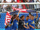 Members of the U.S. men's soccer team take a lap around the field after beating Panama 1-0 to capture the CONCACAF Gold Cup on Sunday in Chicago. Members of the U.S. men's soccer team take a lap around the field after beating Panama 1-0 to capture the CONCACAF Gold Cup on Sunday in Chicago.