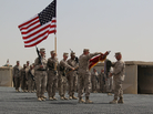Regimental Combat Team 7 cases its flag during their mission's closing ceremony in Helmand Province, Afghanistan. Regimental Combat Team 7 cases its flag during their mission's closing ceremony in Helmand Province, Afghanistan.