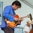 The Rez Abbasi Trio performs at the 2013 Newport Jazz Festival The Rez Abbasi Trio performs at the 2013 Newport Jazz Festival