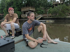 Louis Marcell and Adam Jones prepare to search for old logs, known as sinker wood, on the bottom of Ashley River near Charleston, S.C. They use sonar and a book of old train lines to find the timber, some of which has been preserved in the mud since the 1800s. Louis Marcell and Adam Jones prepare to search for old logs, known as sinker wood, on the bottom of Ashley River near Charleston, S.C. They use sonar and a book of old train lines to find the timber, some of which has been preserved in the mud since the 1800s.