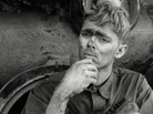 An American soldier reads a letter from home, while taking a break from repairing a tank tread in Lang Vei, Vietnam, in March 1971. An American soldier reads a letter from home, while taking a break from repairing a tank tread in Lang Vei, Vietnam, in March 1971.