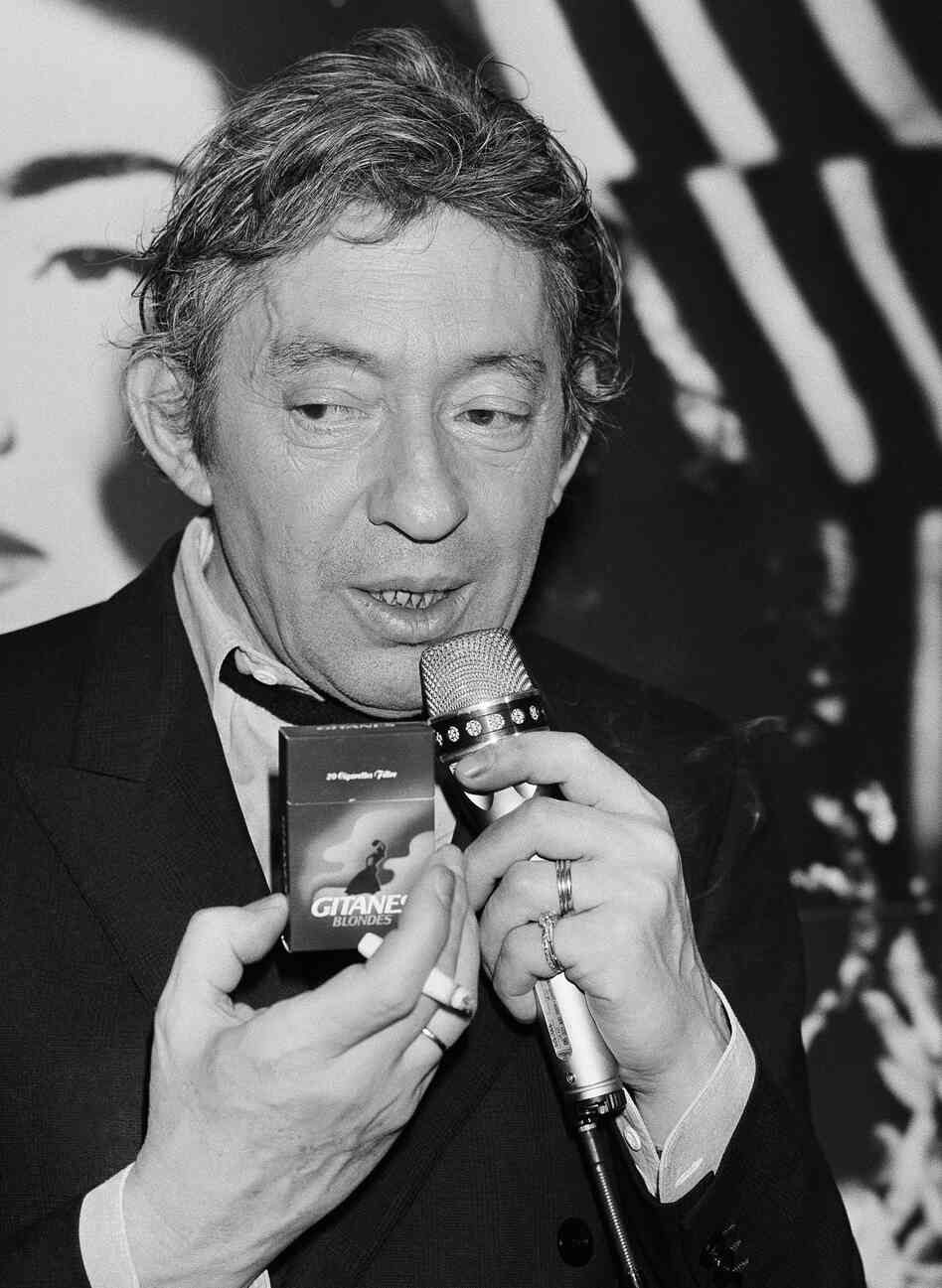 French singer, composer and well-known smoker Serge Gainsbourg presents the new Gitane Blonde cigarette at a press conference at Paris hotel George V, on April 29, 1986. French singer, composer and well-known smoker Serge Gainsbourg presents the new Gitane Blonde cigarette at a press conference at Paris hotel George V, on April 29, 1986.