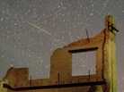 A Perseid meteor streaks across the sky early on August 13, 2007 in the ghost town of Rhyolite, Nevada. A Perseid meteor streaks across the sky early on August 13, 2007 in the ghost town of Rhyolite, Nevada.