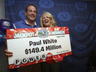 Paul White of Ham Lake, Minn., and his partner Kim VanReese. White bought one of the three winning tickets in Wednesday's $448.4 million Powerball lottery. While one-third of the jackpot is about $149.4 million, he's chosen to take his share in a lump sum rather than spread out over many years. That lump sum is $86 million, which after taxes will be about $58 million. Paul White of Ham Lake, Minn., and his partner Kim VanReese. White bought one of the three winning tickets in Wednesday's $448.4 million Powerball lottery. While one-third of the jackpot is about $149.4 million, he's chosen to take his share in a lump sum rather than spread out over many years. That lump sum is $86 million, which after taxes will be about $58 million.