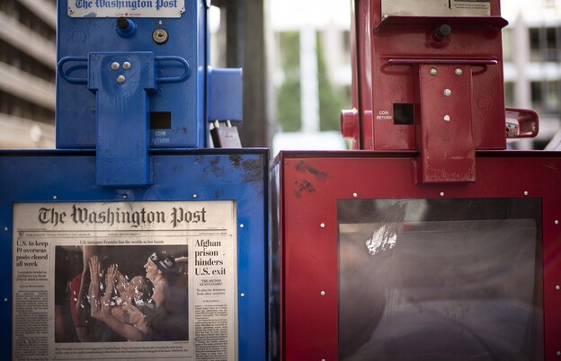 On Monday, the Washington Post Co. announced the sale of its newspaper to Amazon CEO Jeff Bezos, a move that comes as the paper struggles to keep up revenue. (Image credit: AFP/Getty Images)