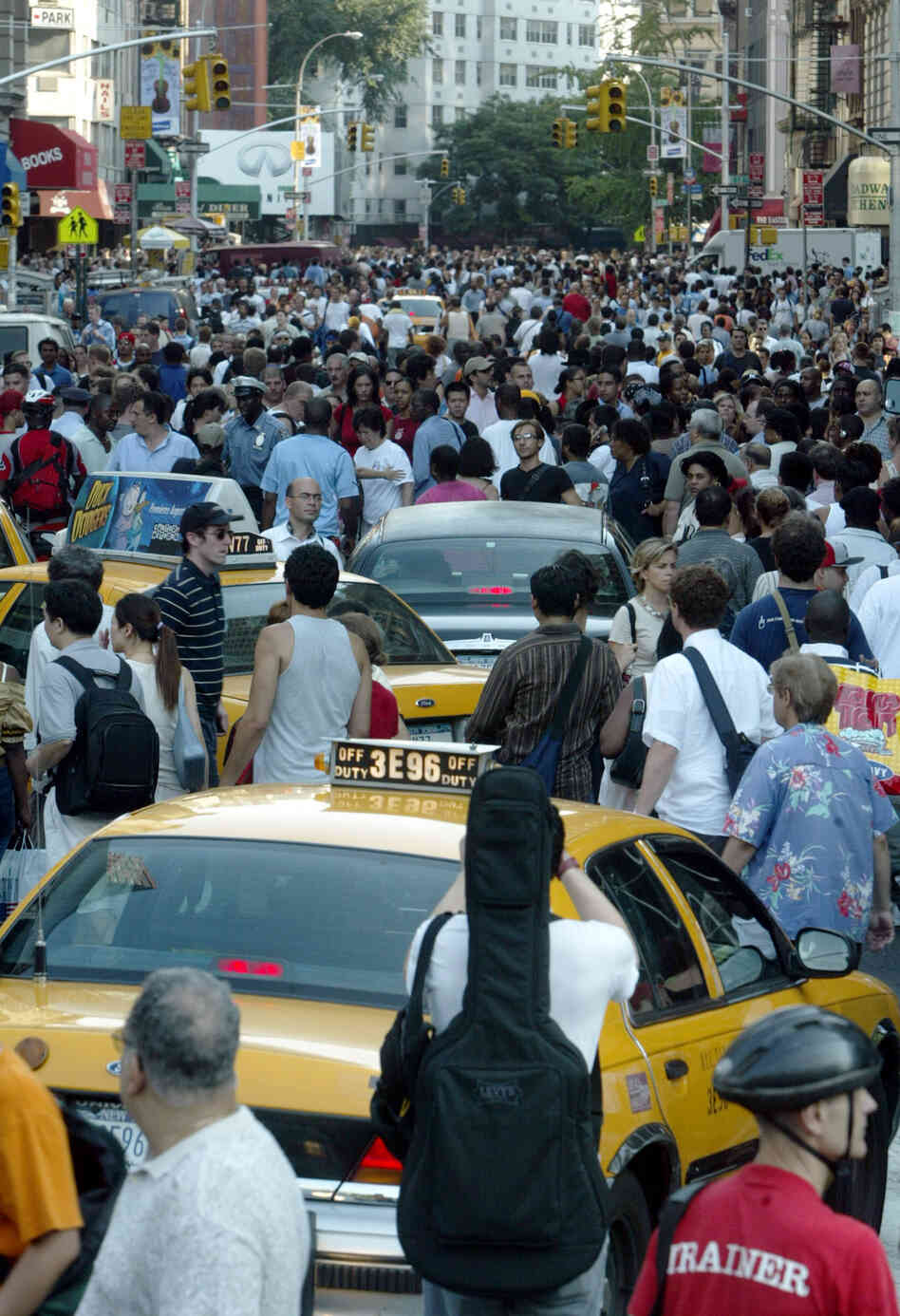 Traffic on Broadway in New York snarled with cars and pedestrians during the outage, which shut down traffic lights and subway service. Traffic on Broadway in New York snarled with cars and pedestrians during the outage, which shut down traffic lights and subway service.