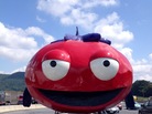 K-Sup, the Fishy Tomato, atop a car advocating stricter food labeling. K-Sup, the Fishy Tomato, atop a car advocating stricter food labeling.