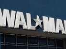 The sign outside of a Wal-Mart store in Norwalk, Conn. The sign outside of a Wal-Mart store in Norwalk, Conn.