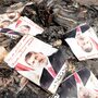 Posters of ousted Egyptian President Mohammed Morsi lay amid the rubble of a protest camp in Cairo after Wednesday's crackdown by government forces.