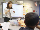 Second-grade teacher Vickie Boudouris goes over a worksheet in an English-learner summer school class at the Cordova Villa Elementary School in June, in Rancho Cordova, Calif. Under Gov. Jerry Brown's proposed budget, California schools will receive an additional $3.6 billion this year, with much of it targeted to the neediest students. Second-grade teacher Vickie Boudouris goes over a worksheet in an English-learner summer school class at the Cordova Villa Elementary School in June, in Rancho Cordova, Calif. Under Gov. Jerry Brown's proposed budget, California schools will receive an additional $3.6 billion this year, with much of it targeted to the neediest students.