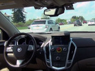 Carnegie Mellon's autonomous car, developed with General Motors, is by all appearances a normal Cadillac SRX crossover — except for the big red button in the middle of the dashboard. In an emergency, the button allows the car to be switched immediately back to standard driving mode. Carnegie Mellon's autonomous car, developed with General Motors, is by all appearances a normal Cadillac SRX crossover — except for the big red button in the middle of the dashboard. In an emergency, the button allows the car to be switched immediately back to standard driving mode.