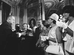 Martin Luther King Jr. attends Lyndon B. Johnson's signing of the Voting Rights Act on Aug. 6, 1965. During this time, the drug war was expanding.