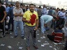 A pro-Morsi supporter stands with other demonstrators in Cairo's Abbassiya neighborhood on Friday. A pro-Morsi supporter stands with other demonstrators in Cairo's Abbassiya neighborhood on Friday.