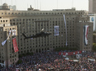 An Egyptian Apache helicopter flies over a crowd of pro-military demonstrators at Tahrir Square in Cairo on July 26. U.S. firms supply military hardware to the military, including the Apache helicopters. An Egyptian Apache helicopter flies over a crowd of pro-military demonstrators at Tahrir Square in Cairo on July 26. U.S. firms supply military hardware to the military, including the Apache helicopters.