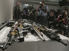Firearms seized during a sweep by the Los Angeles Police Department using the California's Armed Prohibited Persons System initiative. The program uses a database to identify gun owners who are no longer allowed to possess a firearm. Firearms seized during a sweep by the Los Angeles Police Department using the California's Armed Prohibited Persons System initiative. The program uses a database to identify gun owners who are no longer allowed to possess a firearm.