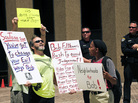 Ruth Johnson (right), who supports San Diego Mayor Bob Filner, speaks with anti-Filner protester Rob Shick (left) during a rally at the San Diego Concourse on Monday. Ruth Johnson (right), who supports San Diego Mayor Bob Filner, speaks with anti-Filner protester Rob Shick (left) during a rally at the San Diego Concourse on Monday.