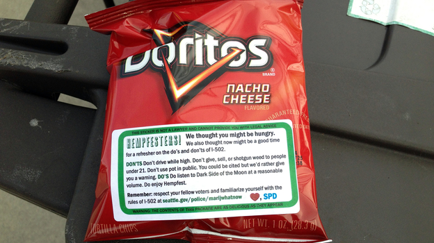 Seattle law enforcement's mellow attitude toward pot was on display at this year's annual Hempfest, where the cops were at the gate — handing out bags of Doritos. (Image credit: NPR)