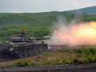 A Japanese tank fires during an annual training exercise at the foot of Mount Fuji in on Tuesday. A Japanese tank fires during an annual training exercise at the foot of Mount Fuji in on Tuesday.