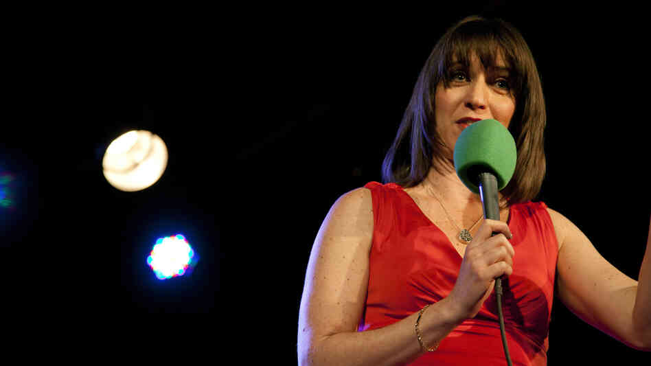 Host Ophira Eisenberg warms up the crowd with some of her comedy routine during a live taping of Ask Me Another at The Bell House in Brooklyn, NY. Host Ophira Eisenberg warms up the crowd with some of her comedy routine during a live taping of Ask Me Another at The Bell House in Brooklyn, NY.