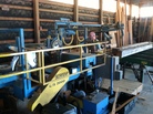 A worker at the Cataumet Sawmill in Falmouth, Mass., where the improved housing outlook has led to more hours for employees. A worker at the Cataumet Sawmill in Falmouth, Mass., where the improved housing outlook has led to more hours for employees.