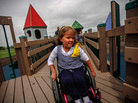 Brooklyn Fisher rolls down the ramp on the playground named for her in Pocatello, Idaho. The playground was built using accessible features so children of all abilities could play alongside each other. Brooklyn Fisher rolls down the ramp on the playground named for her in Pocatello, Idaho. The playground was built using accessible features so children of all abilities could play alongside each other.