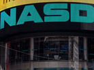 The Nasdaq exchange is seen in Time Square in New York City in this 2012 photograph. The Nasdaq exchange is seen in Time Square in New York City in this 2012 photograph.
