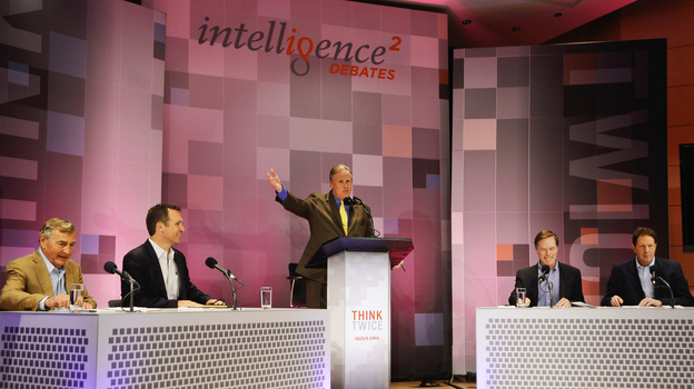 John Donvan moderates an Intelligence Squared U.S. debate on Syria at the Aspen Institute in Aspen, Colo. Those debating are: (from left) Graham Allison, Richard Falkenrath, Nicholas Burns and Nigel Sheinwald. (Image credit: Intelligence Squared U.S.)