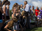 President Obama makes an unannounced stop to talk with the Tully Central High School soccer team about their plans for college in Tully, N.Y., on Friday. President Obama makes an unannounced stop to talk with the Tully Central High School soccer team about their plans for college in Tully, N.Y., on Friday.