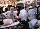 Subway passengers affected by the sarin gas attack on Tokyo's subway system are carried into St. Luke's International Hospital in Tokyo on March 20, 1995. Thirteen people were killed and more than 6,000 injured in the attack, which was carried out by the Aum Shinrikyo cult. Subway passengers affected by the sarin gas attack on Tokyo's subway system are carried into St. Luke's International Hospital in Tokyo on March 20, 1995. Thirteen people were killed and more than 6,000 injured in the attack, which was carried out by the Aum Shinrikyo cult.