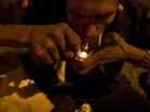 A homeless man smokes crack in the Barrio Triste neighborhood in Medellin, Colombia. A homeless man smokes crack in the Barrio Triste neighborhood in Medellin, Colombia.