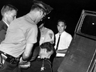 A white heckler arrested during an anti-segregation demonstration in Lexington, Ky., is hustled into a police car in August 1963. Forty years later, the Lexington Herald-Leader ran a correction apologizing for the newspaper's lack of coverage of the civil rights movement. A white heckler arrested during an anti-segregation demonstration in Lexington, Ky., is hustled into a police car in August 1963. Forty years later, the Lexington Herald-Leader ran a correction apologizing for the newspaper's lack of coverage of the civil rights movement.