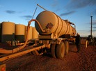 Keith Ceynar transfers oil from his truck into a tank at a facility outside Alexander, N.D. An increasing amount of oil is being delivered by trucks. Keith Ceynar transfers oil from his truck into a tank at a facility outside Alexander, N.D. An increasing amount of oil is being delivered by trucks.