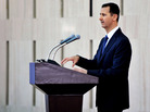Syrian President Bashar Assad delivers a speech at an iftar dinner with political and religious figures in Damascus, Syria, on Aug. 4. In Syria, many different religious groups live in an often uneasy mix. While the country is primarily Sunni Arab, the government is run by minority Alawites like Assad — adherents of an offshoot of Shiite Islam. Syrian President Bashar Assad delivers a speech at an iftar dinner with political and religious figures in Damascus, Syria, on Aug. 4. In Syria, many different religious groups live in an often uneasy mix. While the country is primarily Sunni Arab, the government is run by minority Alawites like Assad — adherents of an offshoot of Shiite Islam.