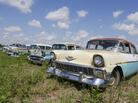 Chevrolets are lined up in a field near the Lambrecht Chevrolet dealership in Pierce, Neb. Later this month, bidders will attend a two-day auction that will feature about 500 old cars and trucks, many with fewer than 10 miles on the odometer. Chevrolets are lined up in a field near the Lambrecht Chevrolet dealership in Pierce, Neb. Later this month, bidders will attend a two-day auction that will feature about 500 old cars and trucks, many with fewer than 10 miles on the odometer.