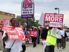 Outside a Taco Bell restaurant in Warren, Mich., early Thursday, supporters of the push by fast-food workers to raise the minimum wage were marching. Outside a Taco Bell restaurant in Warren, Mich., early Thursday, supporters of the push by fast-food workers to raise the minimum wage were marching.