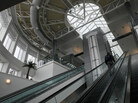 A passenger rides an escalator to Terminal A at the Cincinnati/Northern Kentucky International Airport in Erlanger, Ky. A passenger rides an escalator to Terminal A at the Cincinnati/Northern Kentucky International Airport in Erlanger, Ky.
