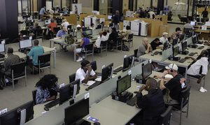 Users take advantage of the technology made available to them at the Martin Luther King Jr. Memorial Library.
