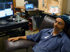 Acting as a "sender," brain researcher Rajesh Rao watches a video game and waits for the time to hit the "fire" button. But he'll only think about doing that — the impulse was carried out by someone in another building, in a recent test of brain-to-brain communication. Acting as a "sender," brain researcher Rajesh Rao watches a video game and waits for the time to hit the "fire" button. But he'll only think about doing that — the impulse was carried out by someone in another building, in a recent test of brain-to-brain communication.