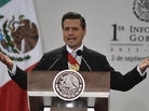Mexican President Enrique Pena Nieto presents his first annual report to the nation during a ceremony before the Congress at his presidential residence in Mexico City on Monday. Mexican President Enrique Pena Nieto presents his first annual report to the nation during a ceremony before the Congress at his presidential residence in Mexico City on Monday.
