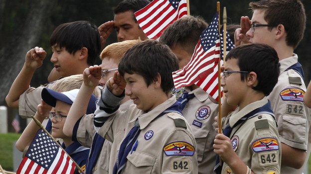 Boy Scouts attend a Memorial Day event in Los Angeles in May. A bill under consideration by the California Legislature would take away the tax-exempt status of the Boy Scouts of America. (Image credit: Reuters/Landov)