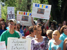 Protesters gathered outside the Yellowstone County Courthouse in Billings, Mont., on Thursday, call for the resignation of a state judge over comments he made about the teenage victim in a rape case. Protesters gathered outside the Yellowstone County Courthouse in Billings, Mont., on Thursday, call for the resignation of a state judge over comments he made about the teenage victim in a rape case.