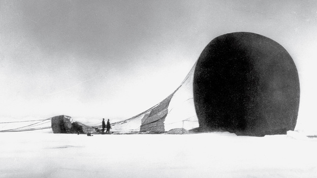 Members of S. A. Andrée's 1897 journey survey their downed vessel. This photo was recovered from a camera when their remains were found 33 years later. (Image credit: Courtesy of Grenna Museum, Andréexpeditionen Polarcenter/Swedish Society for Anthropology and Geography/National Geographic)