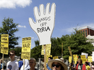 Protesters against U.S. military action in Syria march to Capitol Hill from the White House on Saturday. Protesters against U.S. military action in Syria march to Capitol Hill from the White House on Saturday.