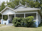 This house in Pine Bluff, Ark., was the scene of a shootout Saturday evening, as Monroe Isadore, 107, held off police for hours before being killed. He had been approached about moving out, a roommate says. This house in Pine Bluff, Ark., was the scene of a shootout Saturday evening, as Monroe Isadore, 107, held off police for hours before being killed. He had been approached about moving out, a roommate says.