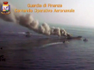 An aerial image shows the Gold Star cargo ship ablaze. Officials say the ship's crew set fire to 30 tons of hashish after authorities approached the vessel for inspection. An aerial image shows the Gold Star cargo ship ablaze. Officials say the ship's crew set fire to 30 tons of hashish after authorities approached the vessel for inspection.